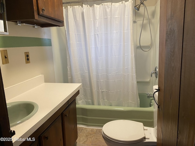 bathroom with shower / tub combo and vanity