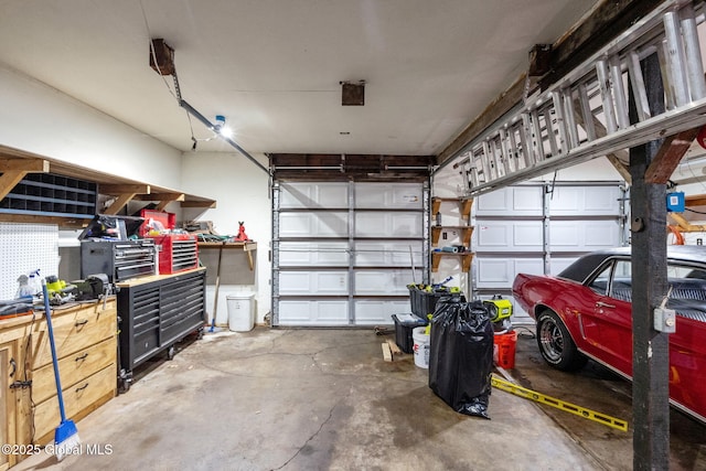 garage with a workshop area