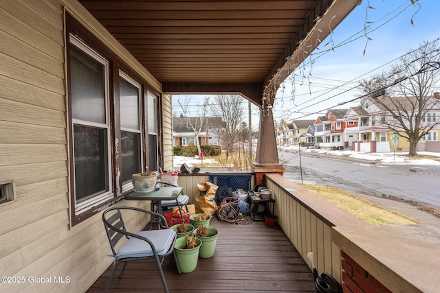 balcony with a residential view and a porch