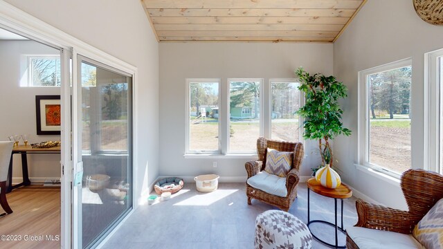 sunroom with wood ceiling and vaulted ceiling