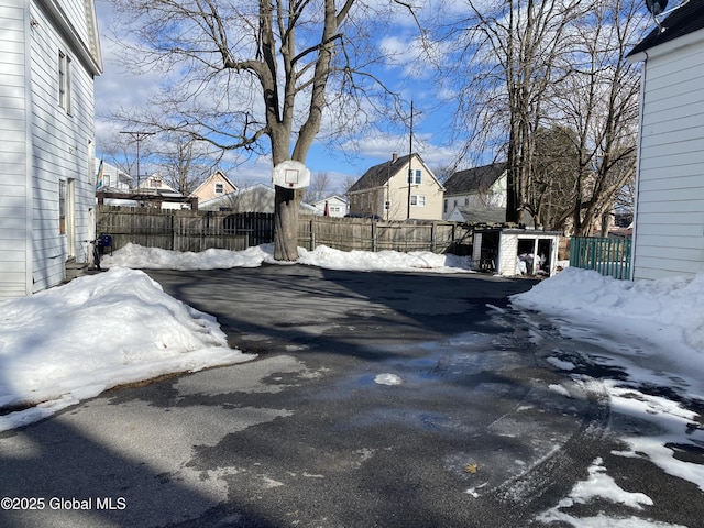 view of road with a residential view and driveway