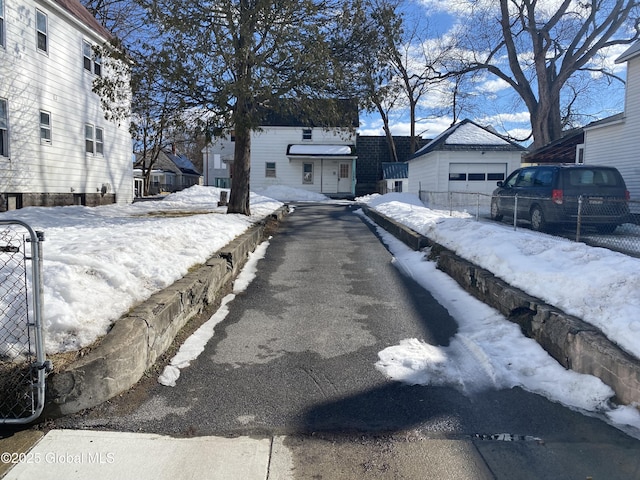 view of road with aphalt driveway