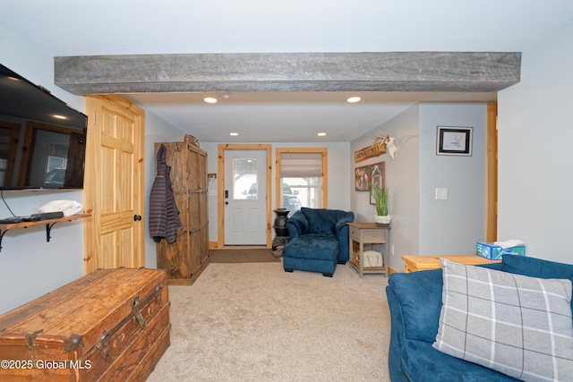 living area with recessed lighting and carpet flooring