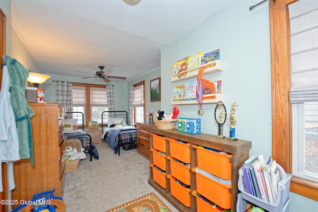 carpeted bedroom with ornamental molding