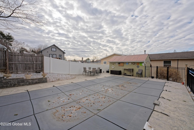 exterior space with a fenced in pool and a fenced backyard