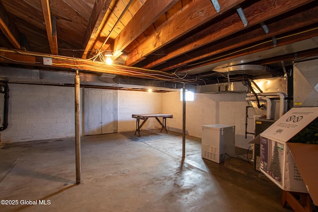 basement featuring refrigerator