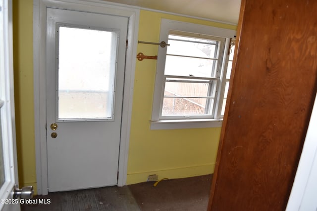 doorway with wood finished floors