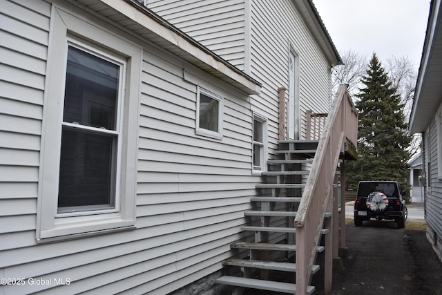 view of property exterior with stairway