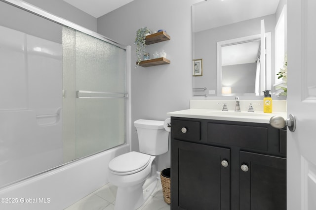 full bath featuring combined bath / shower with glass door, toilet, and vanity