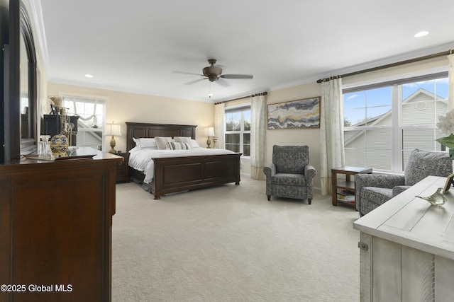 bedroom with crown molding, recessed lighting, a ceiling fan, and light carpet