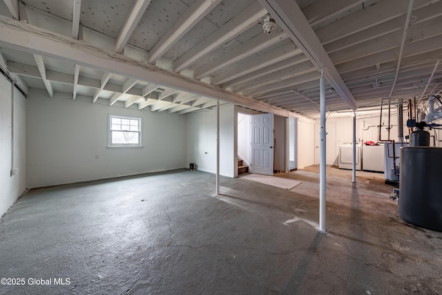 basement with stairway and independent washer and dryer