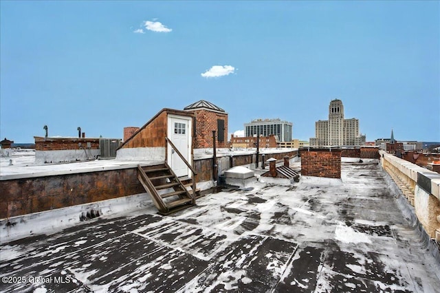 details with a view of city, central AC, and entry steps