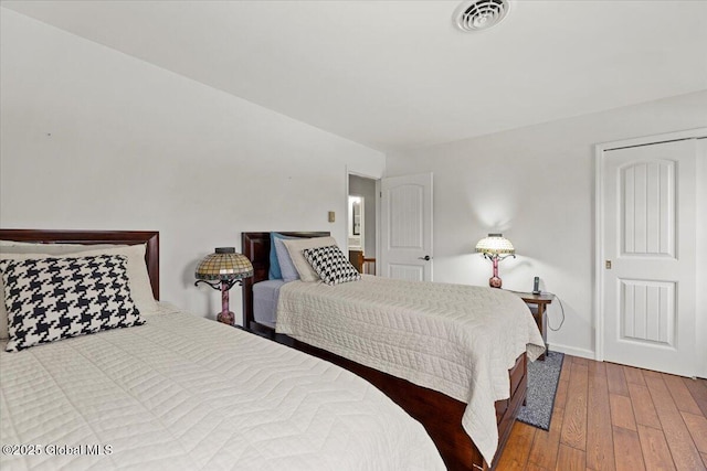 155 Andrews Rd, Carlisle, NY 12160 - bedroom with visible vents, baseboards, and hardwood / wood-style floors
