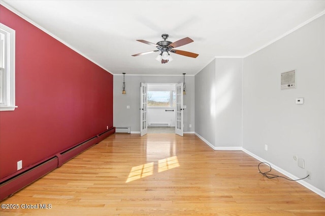 unfurnished room featuring light wood-style floors, a baseboard radiator, a baseboard heating unit, and crown molding