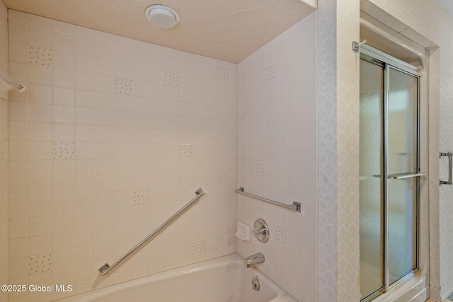 full bathroom featuring combined bath / shower with glass door