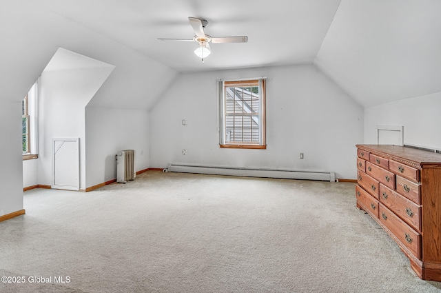 18 Johnson Ln, Poestenkill, NY 12018 - bonus room featuring radiator, baseboard heating, lofted ceiling, carpet floors, and a ceiling fan