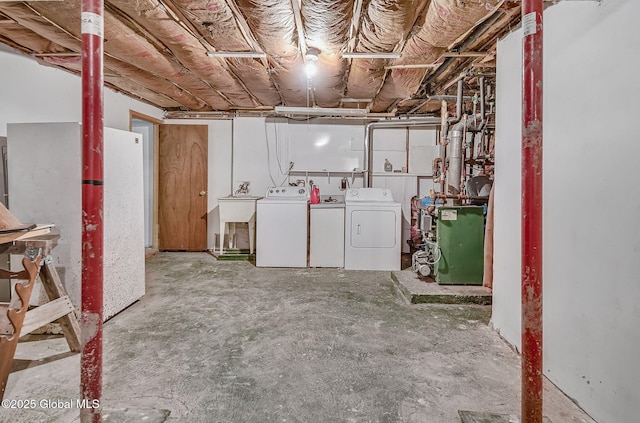 18 Johnson Ln, Poestenkill, NY 12018 - unfinished below grade area with washer and clothes dryer and a heating unit