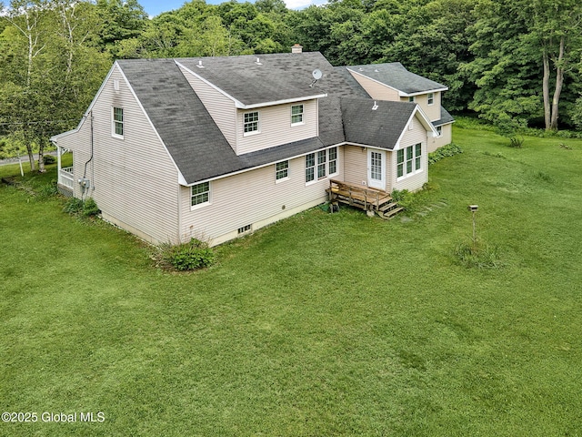 18 Johnson Ln, Poestenkill, NY 12018 - back of property with a lawn, roof with shingles, and a chimney