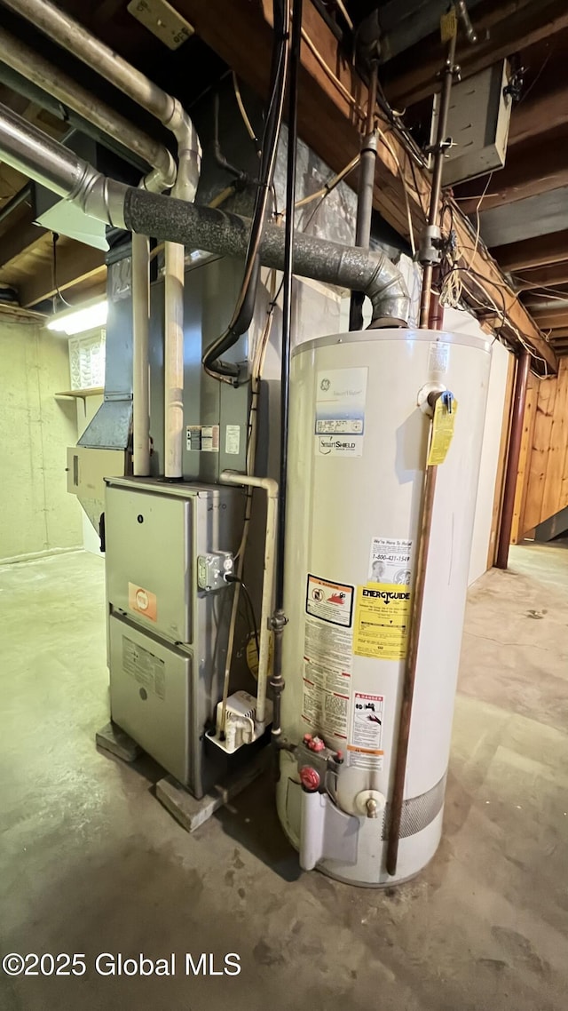 utility room with gas water heater