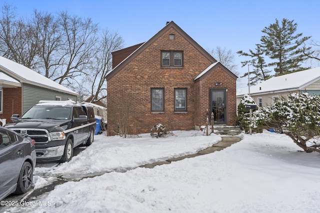 view of front of house with brick siding