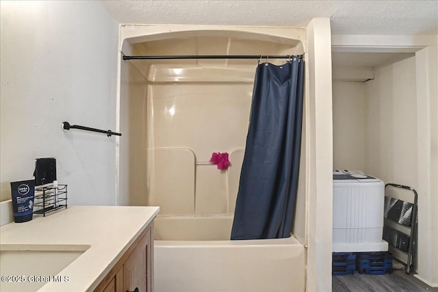 full bath featuring vanity, shower / bath combination with curtain, wood finished floors, and a textured ceiling