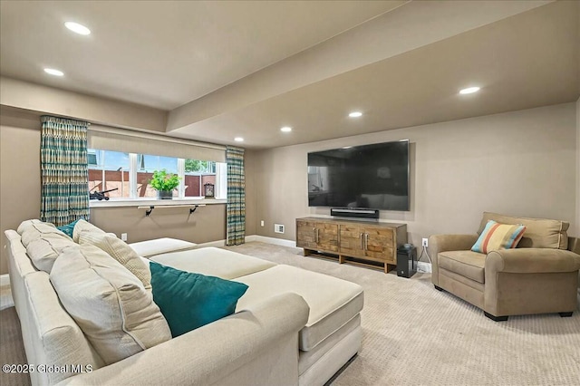 living room with recessed lighting, baseboards, and carpet floors