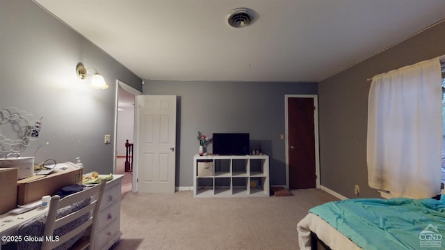 bedroom featuring baseboards, visible vents, and light colored carpet