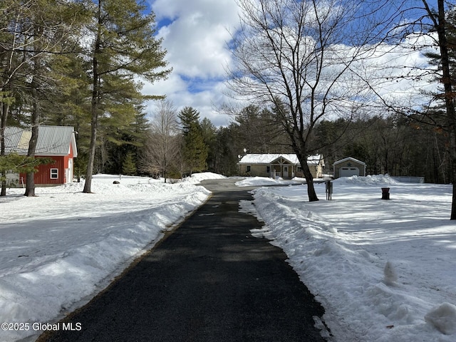 view of road with aphalt driveway