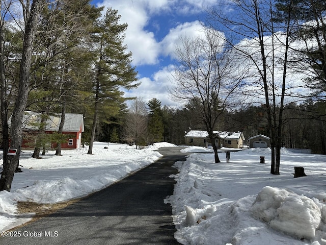 view of street featuring driveway