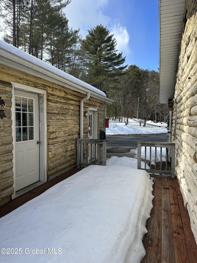 view of snow covered deck