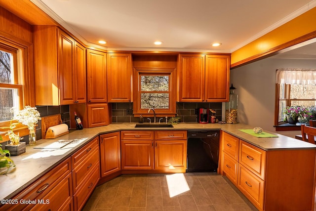 kitchen featuring black dishwasher, decorative backsplash, recessed lighting, a peninsula, and a sink