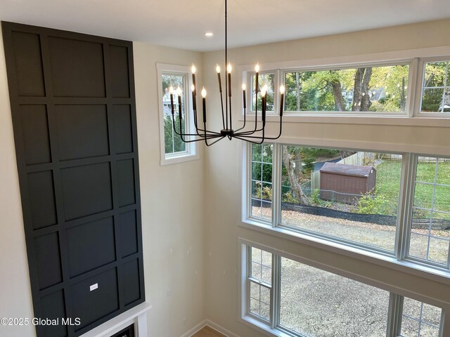 interior space featuring recessed lighting and an inviting chandelier