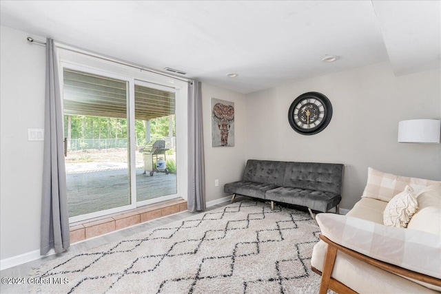 living room featuring visible vents and baseboards