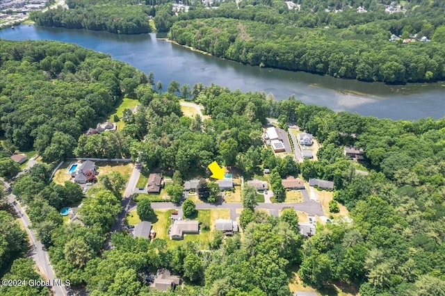 aerial view with a water view, a residential view, and a view of trees