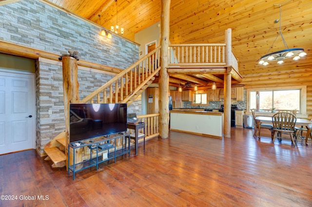 living room with hardwood / wood-style flooring, stairway, wood ceiling, and high vaulted ceiling