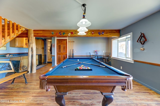 playroom featuring billiards, wood finished floors, and baseboards