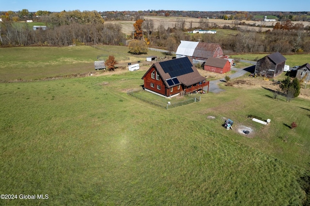 birds eye view of property with a rural view