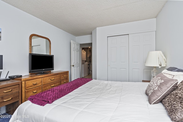 bedroom with a closet and a textured ceiling