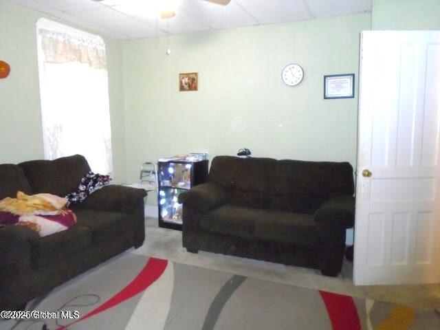 living room featuring ceiling fan