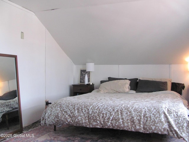 bedroom with vaulted ceiling