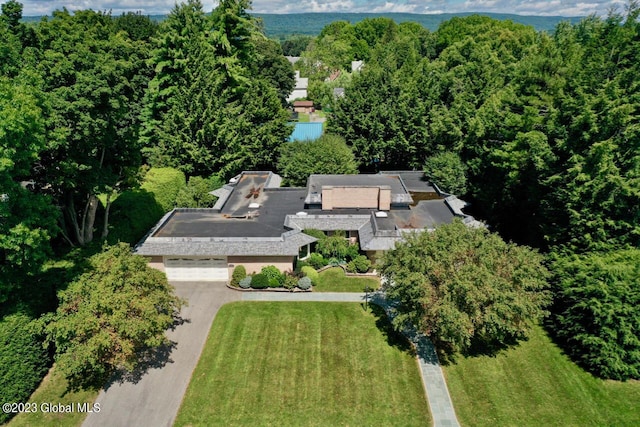 aerial view with a wooded view