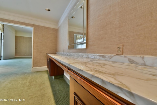 bathroom featuring wallpapered walls, vanity, baseboards, and ornamental molding