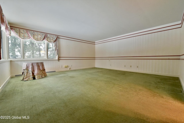 unfurnished room featuring carpet flooring