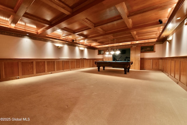 rec room featuring a wainscoted wall, carpet floors, beam ceiling, wooden ceiling, and coffered ceiling