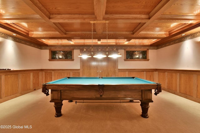 rec room with beam ceiling, wainscoting, coffered ceiling, and carpet floors