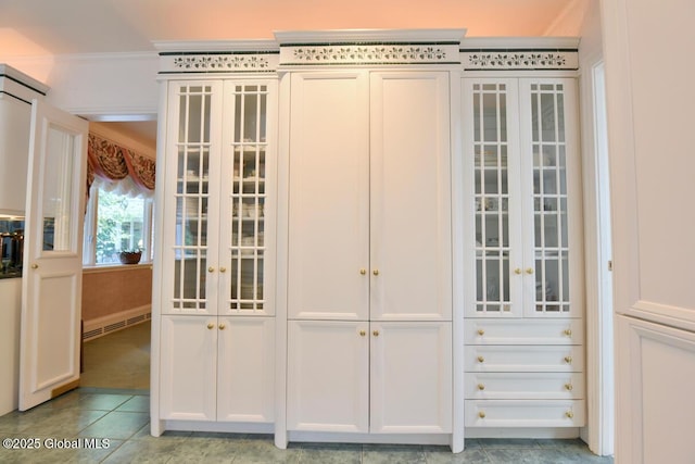 closet featuring baseboard heating