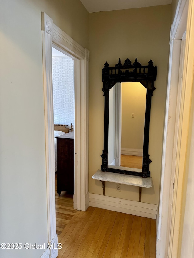 corridor with wood finished floors