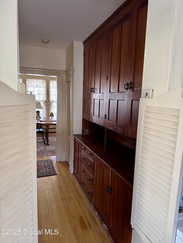 hall with light wood-style floors