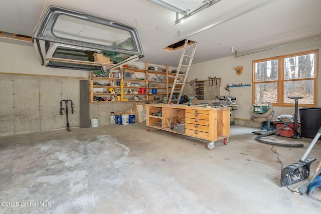 garage featuring a workshop area