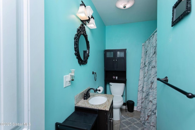 full bath with tile patterned flooring, toilet, vanity, and a shower with curtain